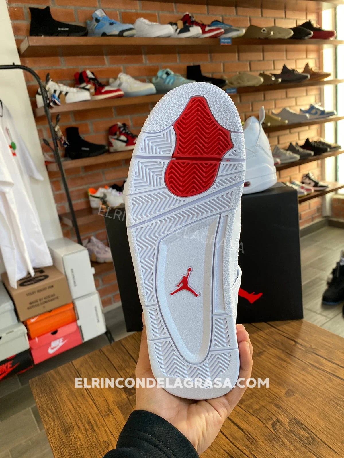 Jordan 4 Metallic Red Sneakers