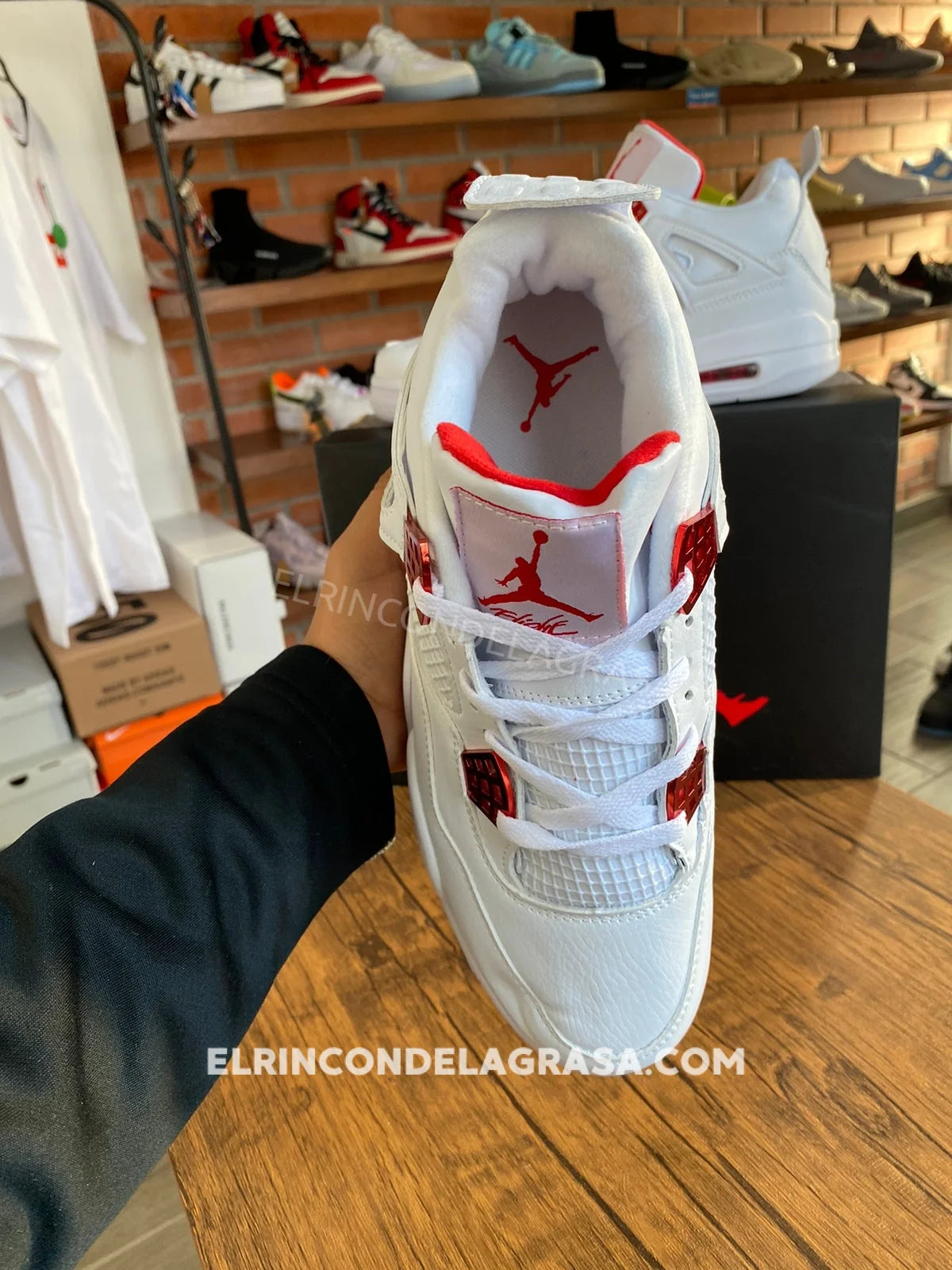Jordan 4 Metallic Red Sneakers