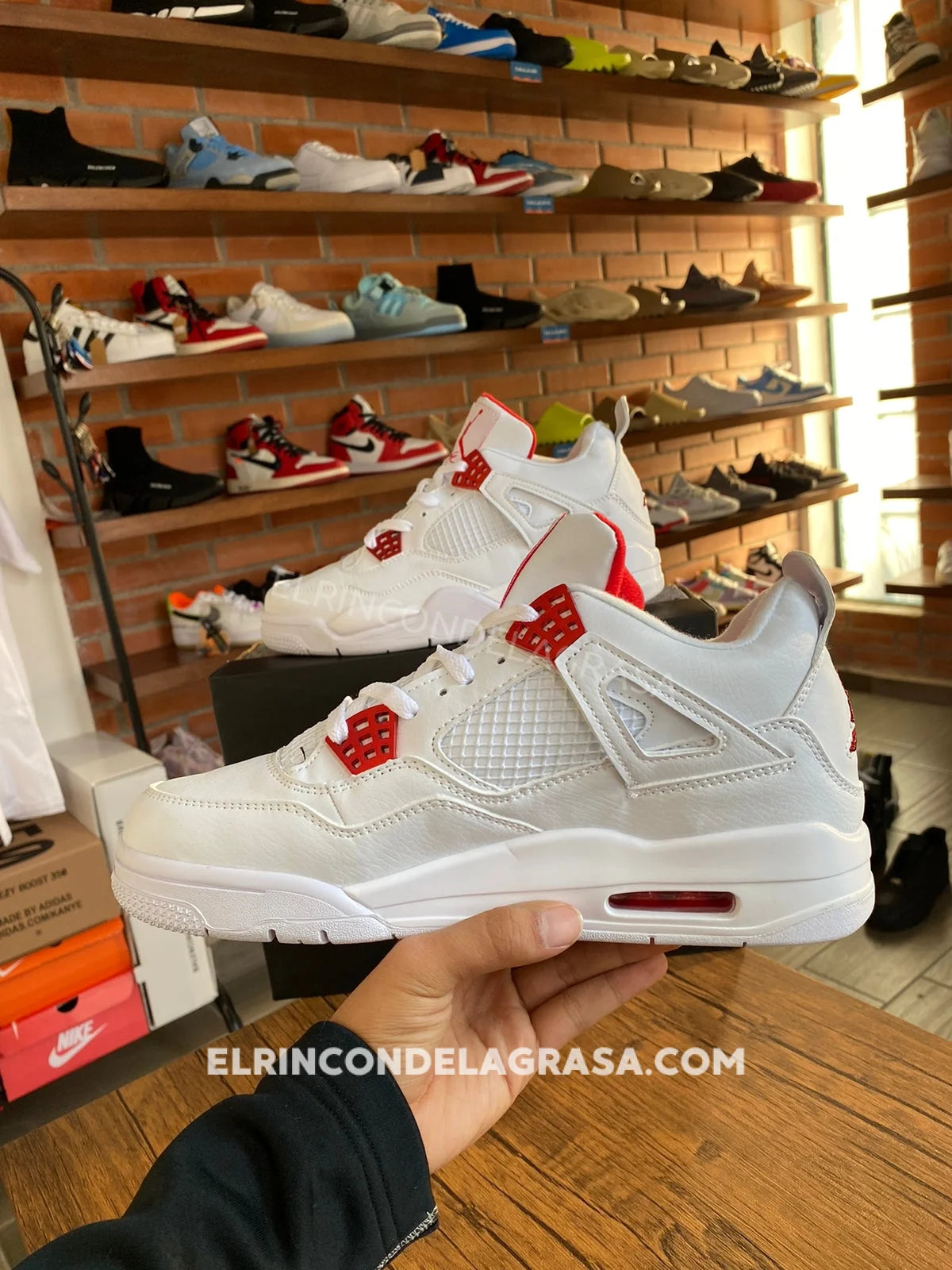 Jordan 4 Metallic Red Sneakers