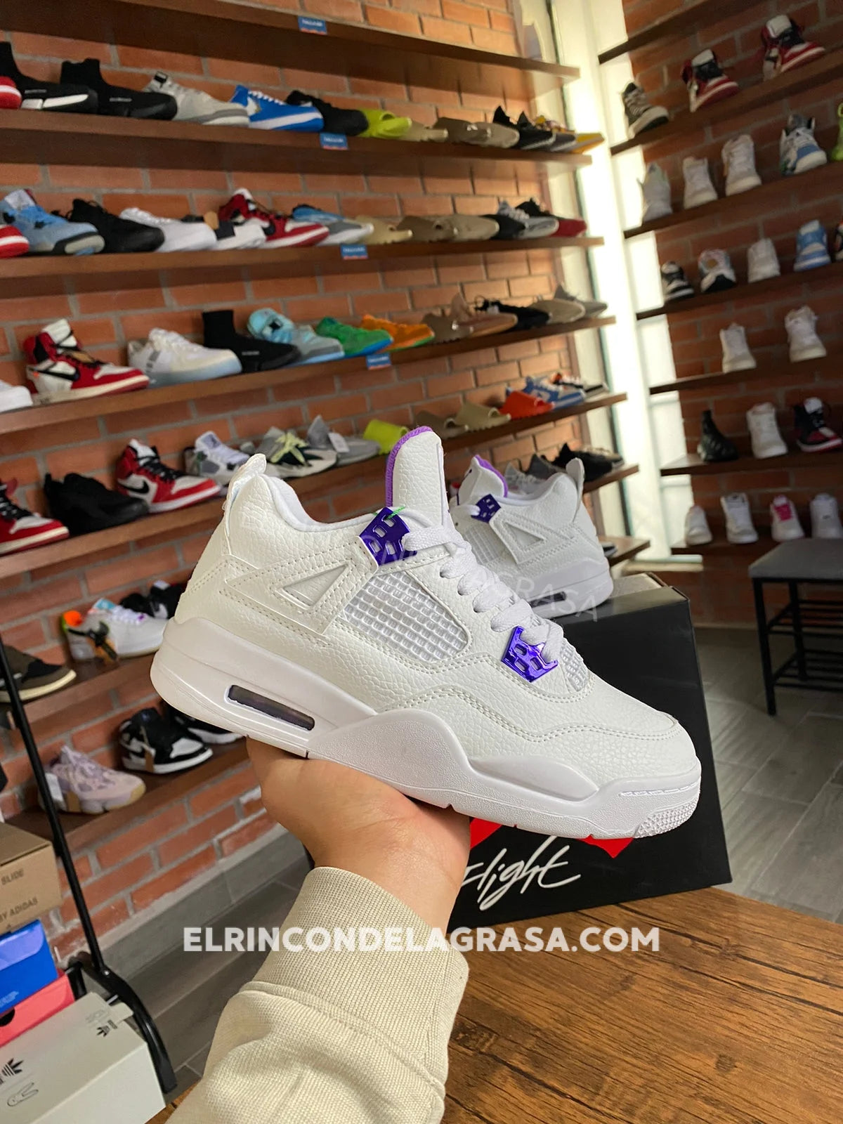 Jordan 4 Metallic Purple Sneakers