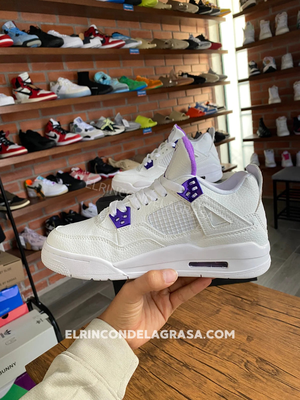 Jordan 4 Metallic Purple Sneakers